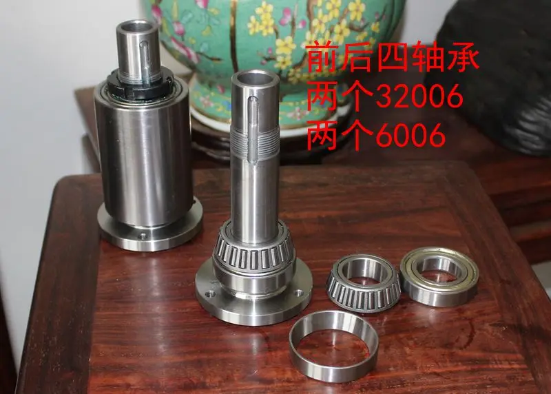 Four-bearing spindle with 80 chucksSmall lathe spindle high-strength lathe head assembly with flange and four bearings