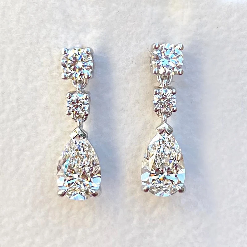 Huitan Temperament Kristall cz Tropfen Ohrringe für Frauen hochwertige silberne Farbe Braut Hochzeit Ohrringe zeitlosen Stil Schmuck