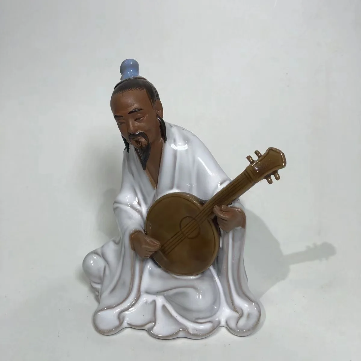 

Decoration of Chinese statue, A musician who plays the piano Statue Ceramic Figure---Shiwan Kiln porcelain