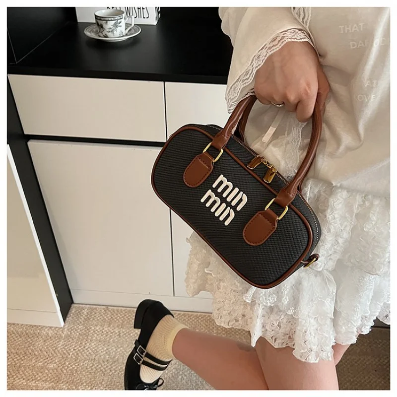 Bolsa de ombro feminina com couro fino casual vintage famoso durável leve estilo moderno ​