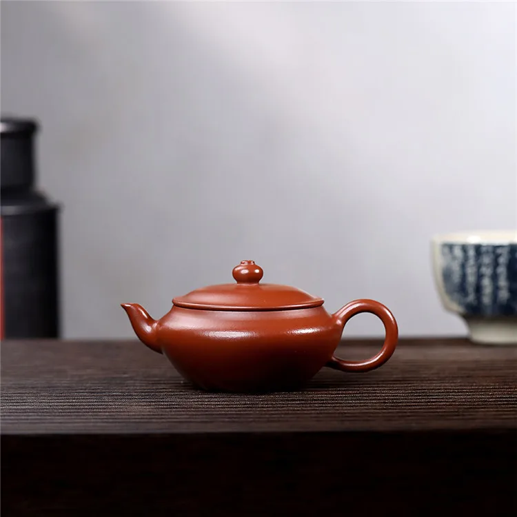 

Handmade Flat Purple Clay Pot Yixing Famous Ore Small Coal Kiln Sand Home Teapot Inner Pile Ball Hole 80