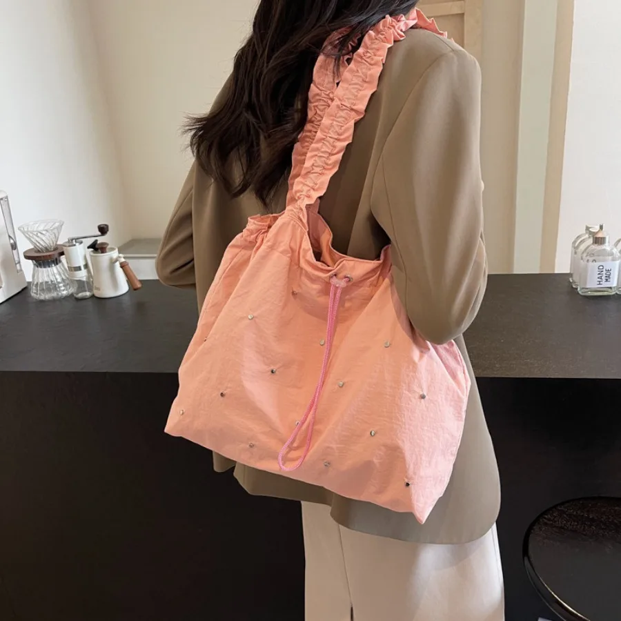 

Fashion Korean new simple ins rivets personality pleated Tote bag commuter shoulder bag lightweight handheld armpit bags