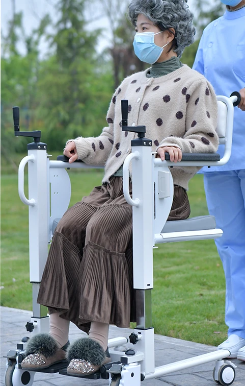 Multifunctional nursing transfer machine for paralyzed elderly, hand operated elevator, household toilet chair