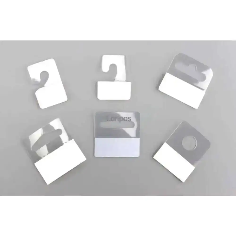 

Bulk Hang Tabs Delta Slotted Self-adhesive Merchandise Package Box Bag Pet Pvc Hangers Peghook Plastic Display Reinforced Tag