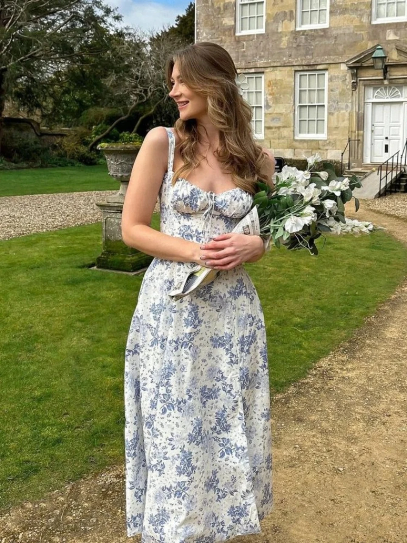 

Women's floral style camisole, shoulder baring, waist cinching, long back strap, French dress