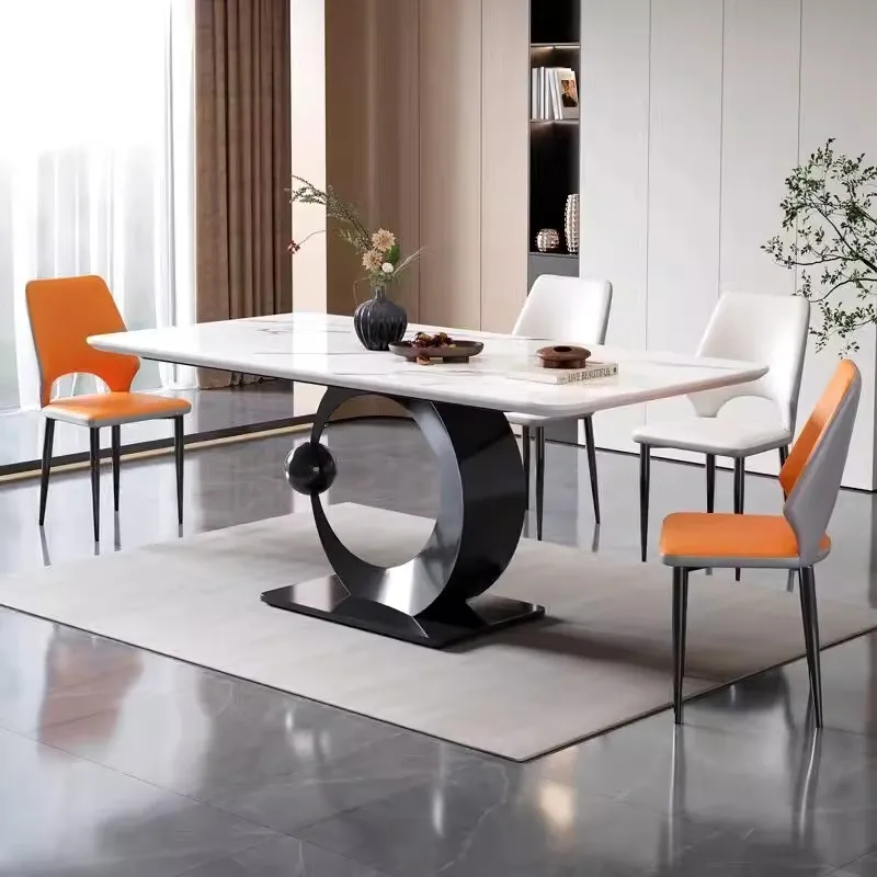 Italian minimalist sintered stone dining table and chair combination, moon ball rectangular home high-end minimalist dining