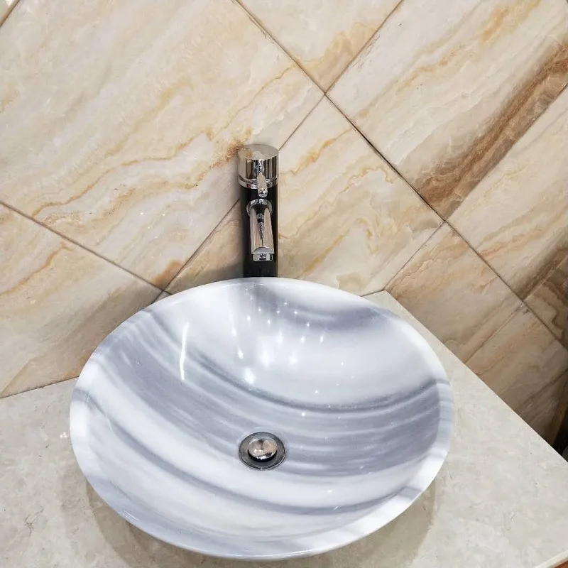 Marmo bianco a grana dritta, lavabo rotondo di arte europea boutique, lavabo in pietra per uso domestico