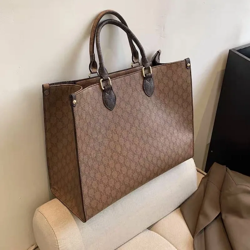 2024 nuova borsa di nicchia borsa per la spesa portatile di moda da donna borsa Versatile per pendolari di grande capacità borsa temperamento