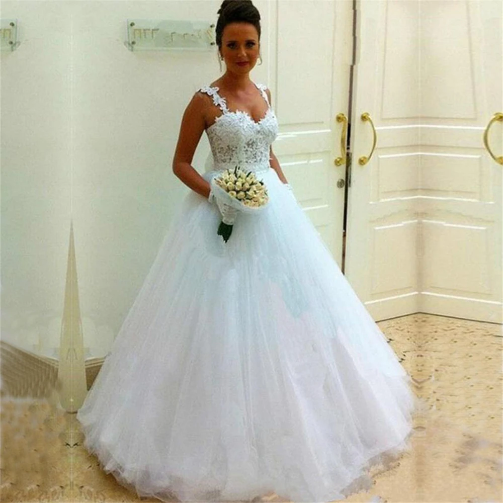 ZJ9213 Customized Graceful Wedding Dresses A-Line Ball Gowns Tulle And Lace Bridal Gowns Spaghetti Straps Backless 2026