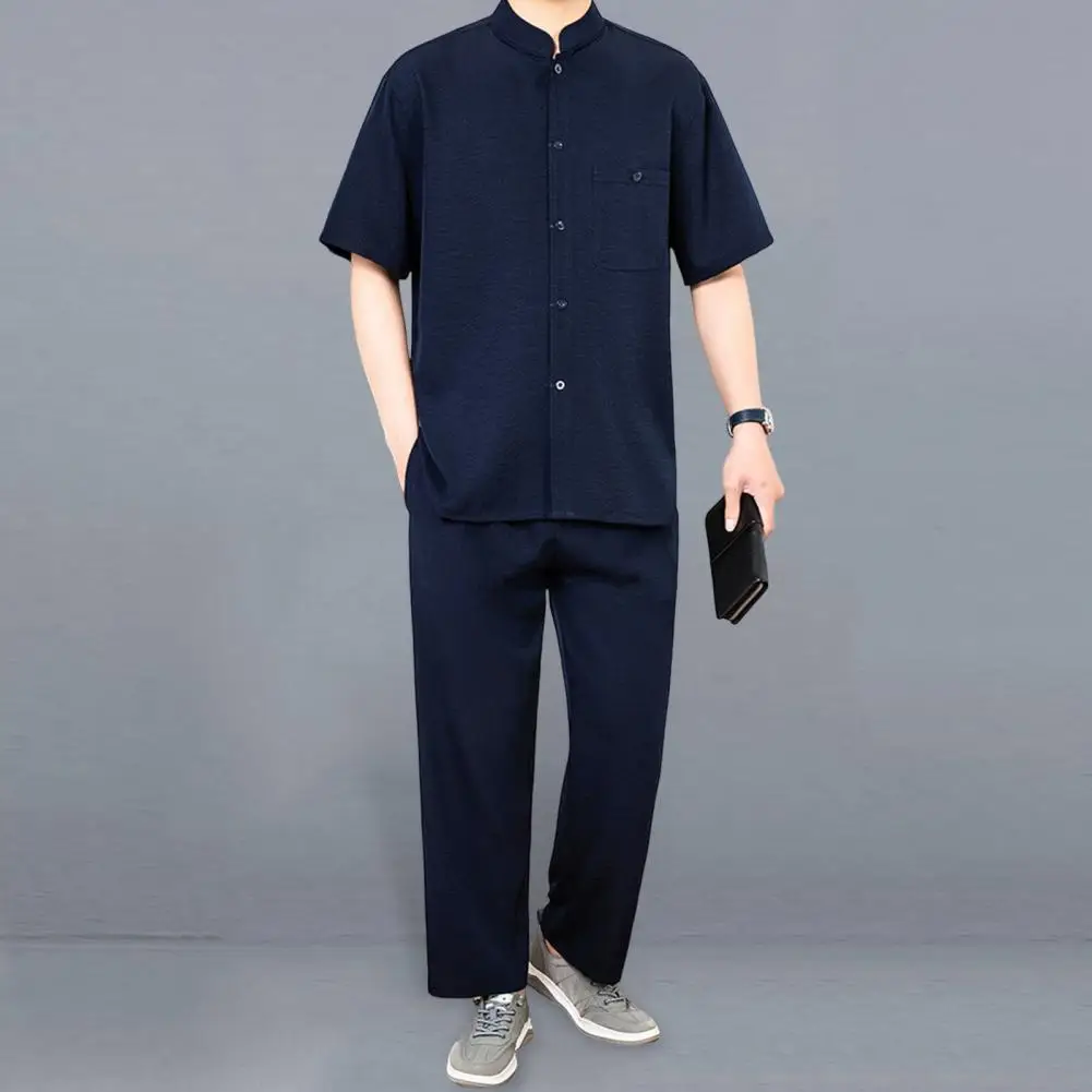 Conjunto de 2 unidades de traje para hombre con cuello levantado, camisa de manga corta con una botonadura, pantalones largos con cintura elástica, conjunto de Color sólido, corte holgado, ocio