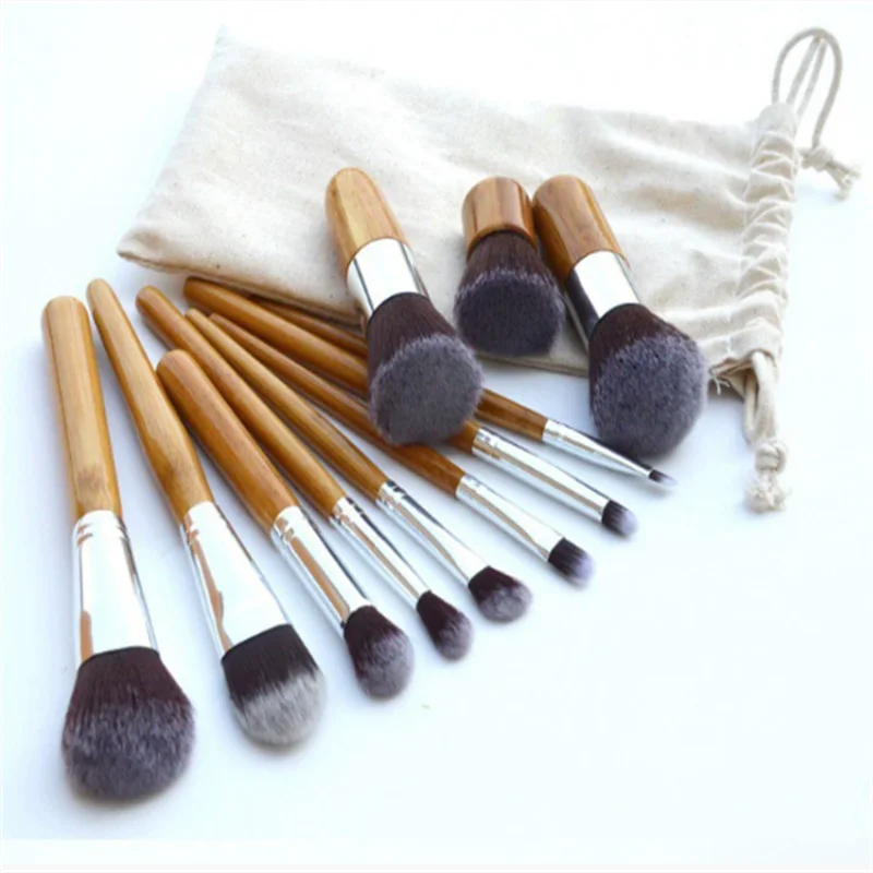 مجموعة فرش مكياج مكونة من 11 قطعة من الخيزران مع حقيبة قماش صديقة للبيئة عبر الحدود الأكثر مبيعًا أدوات تجميل محمولة بالجملة