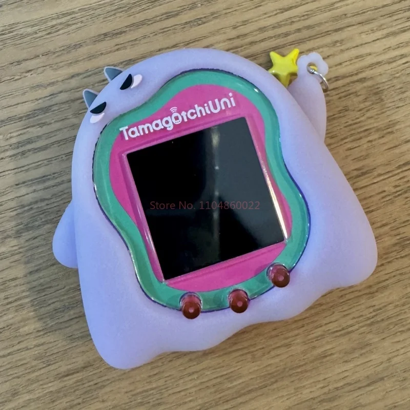 Etui na cyfrowego zwierzaka Tamagotchi Uni - świecące w ciemności diabełkowe fioletowo-różowe silikonowe etui ochronne na zabawkę