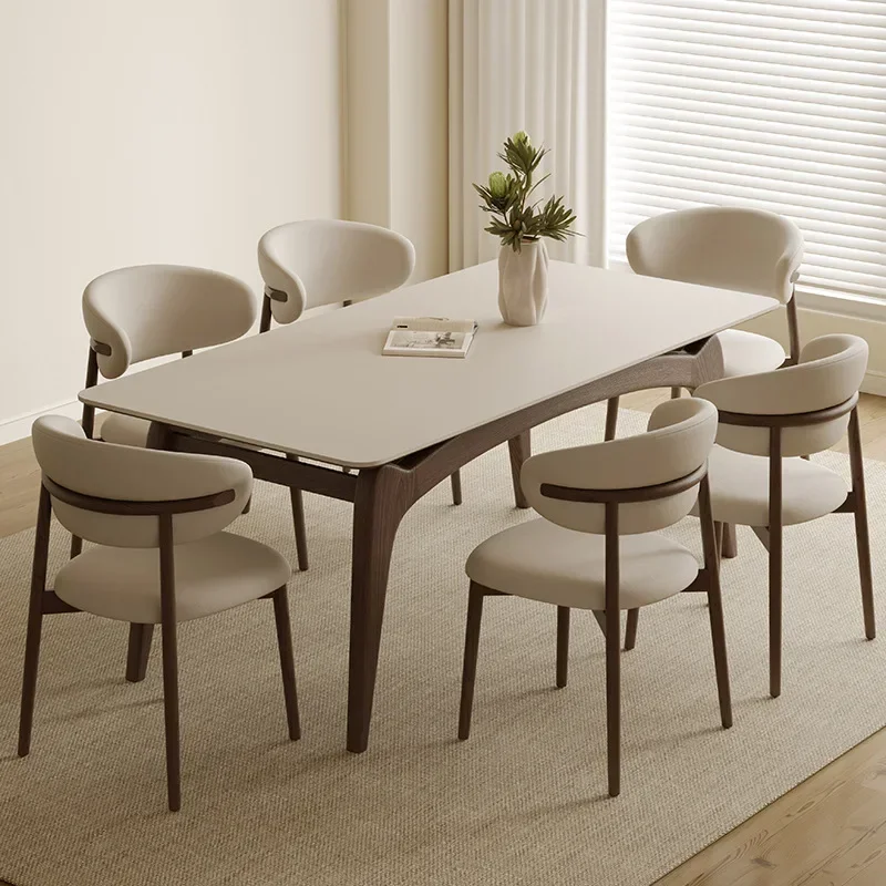 

Rock solid wood dining table Modern simple luxury ash small apartment suspended rectangular rock dining table and chair.