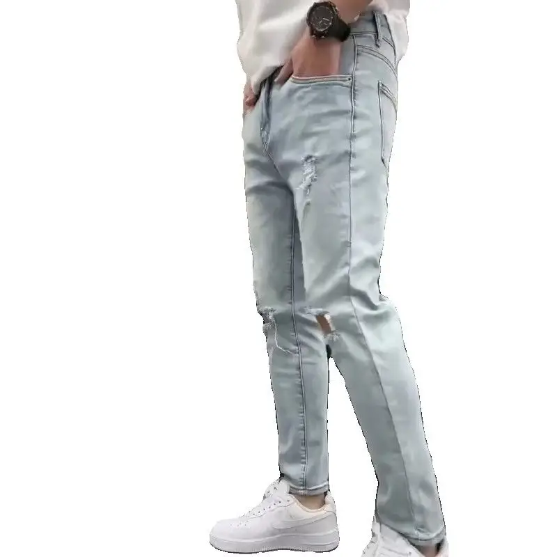 Pantaloni a matita Casual in Denim Slim Fit da uomo alla moda con Design strappato primavera autunno Jeans Streetwear elasticizzati strappati per uomo