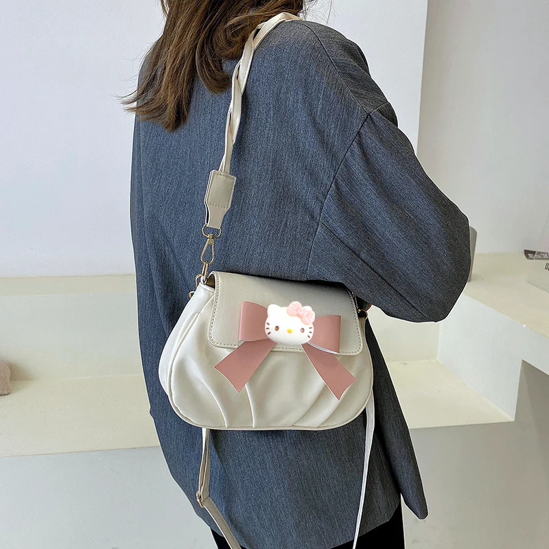

Sanrio hello kitty Bow messenger Bag kuromi Women's 2023 New Retro Fashion Pleated Twist Shoulder Bag pu handbag