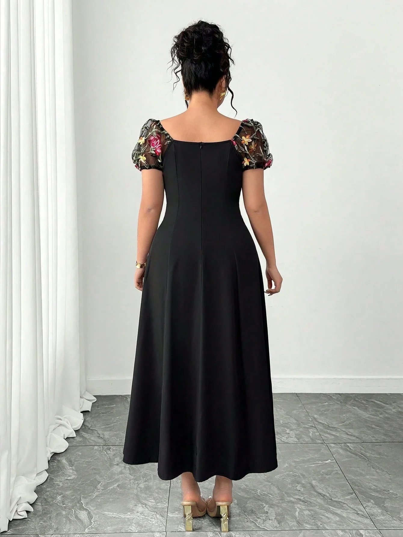 

Elegant Black A-Line Midi Dress With Floral Embroidered Puff Sleeves And Side Split