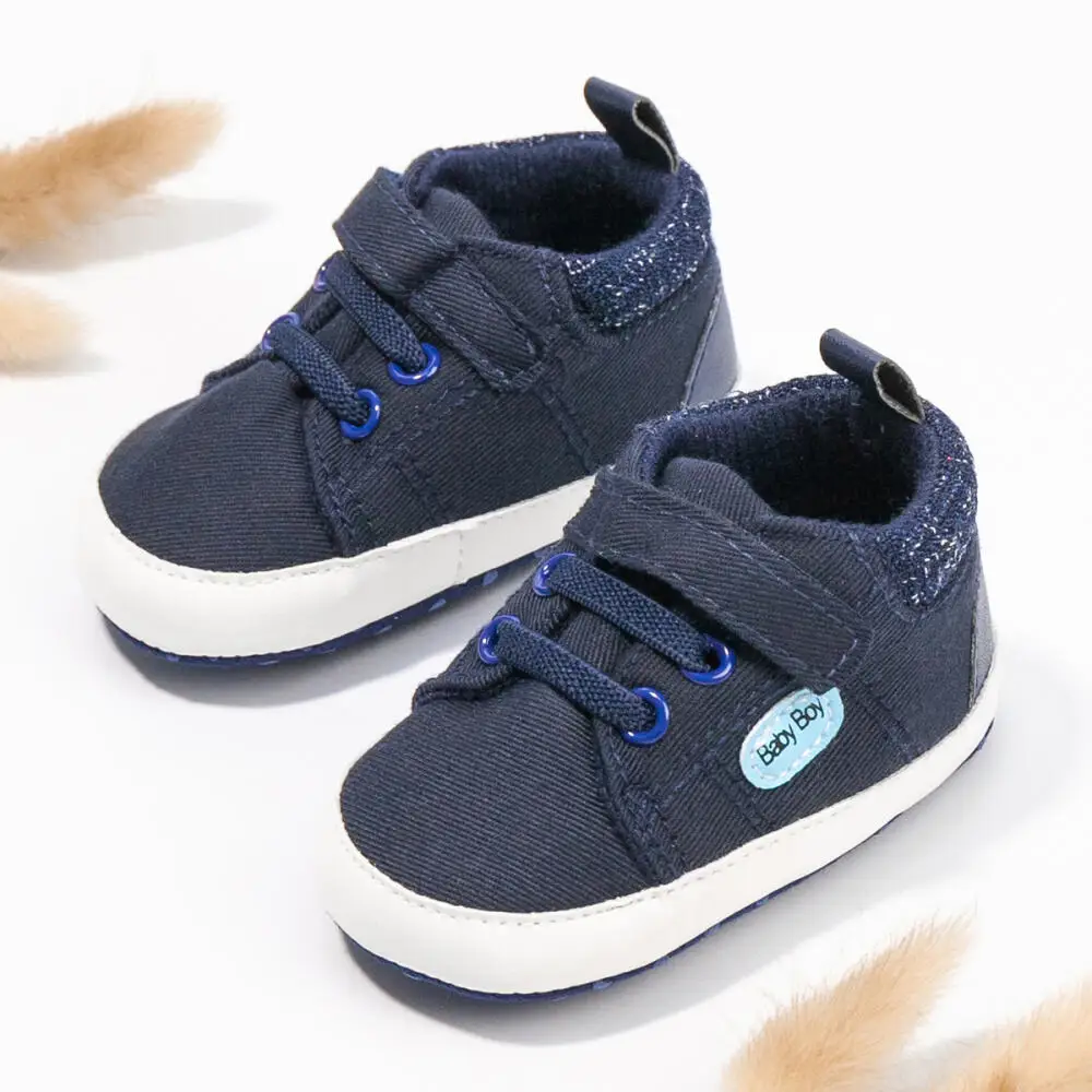 Neonato nuovo classico bambino scarpe di tela tinta unita scarpe casual suola in morbido cotone antiscivolo scarpe da ginnastica per bambini scarpe da bambino per il primo giorno