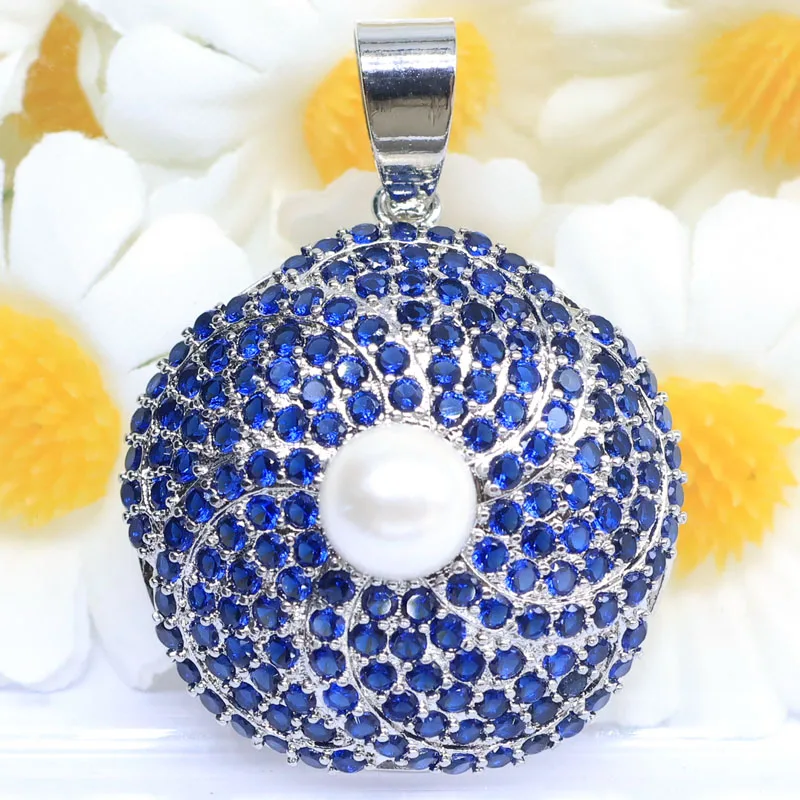 

Новый дизайн, 32x24 мм, 4.4 г, кулон в форме цветка с танзанитом, оранжевым спессартином, гранатом и белым сапфиром, посеребренный, для женщин