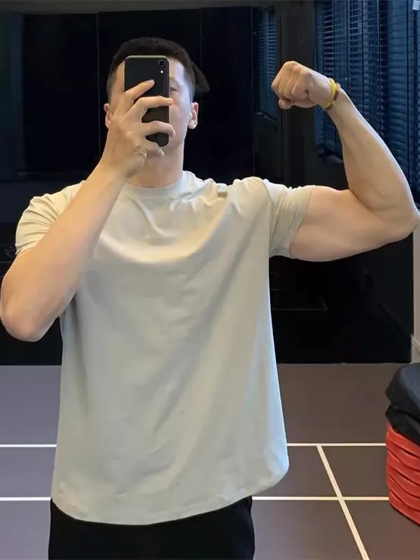 

Летняя тонкая мужская спортивная футболка большого размера (до 300 фунтов), свободного кроя, для тренировок, быстросохнущая, с охлаждающим эффектом, эластичная