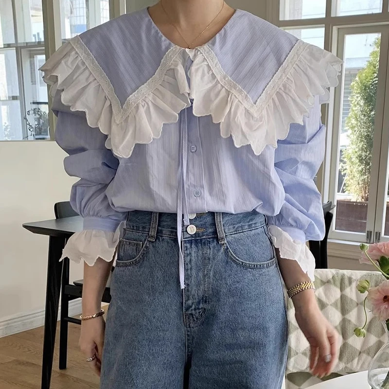 

Стильная женская блузка для ранней осени: молодежная, с рюшами, темно-синим воротником, свободного кроя, универсальная, с поясом, длинными рукавами, в полоску, для офиса и повседневной носки