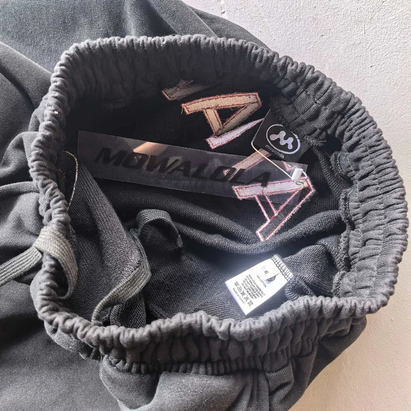 Mowalola التطريز الملاك الحرب الحصان أرقام 6 التسمية Sweatpants الرجال النساء الأسود فضفاض عادية واسعة الساق عداء ببطء بنطلون السراويل الترنك