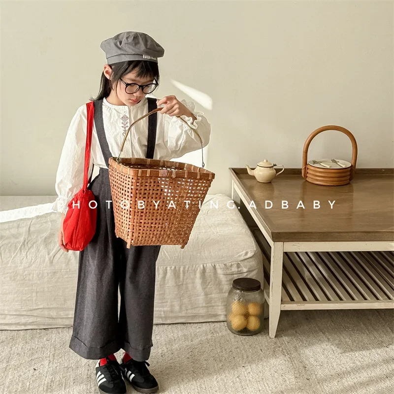 2025 ربيع ملابس الأطفال ملابس الربيع الأطفال النسخة الكورية حزام السراويل نحى تسعة سنت السراويل بنطال ذو قصة أرجل واسعة