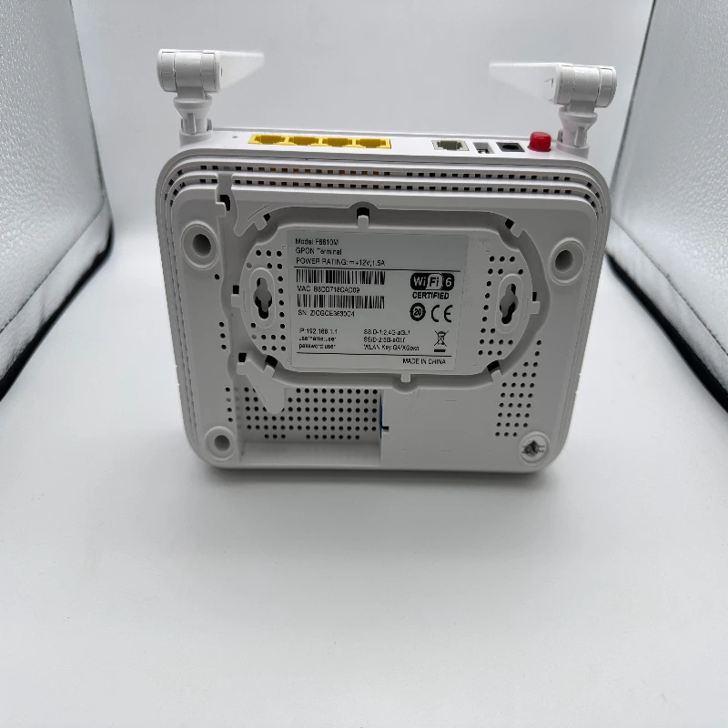 جهاز توجيه WiFi6 ONU F6610m Xpon Ont للمنزل والمكتب تردد واحد 2.4G 4GE 1TEL مودم ألياف أحادي الوضع FTTH البرامج الثابتة الإنجليزية
