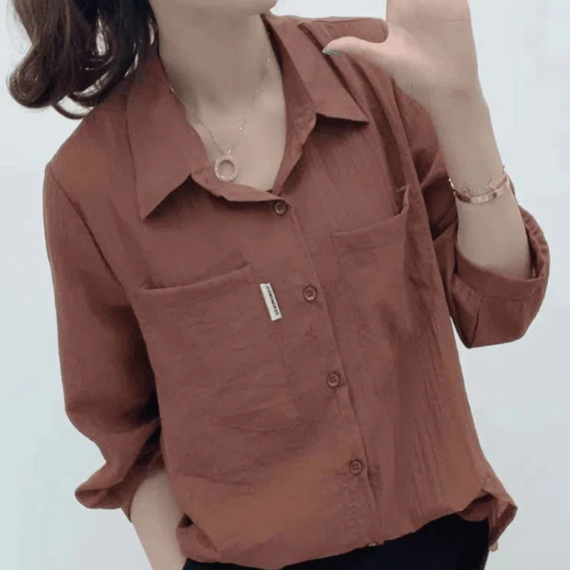 Summer Women's 2024 New Spliced Polo Collar Button Pocket Fashion Solid Color Loose Minimalist Casual Long Sleeve Blouses Shirts