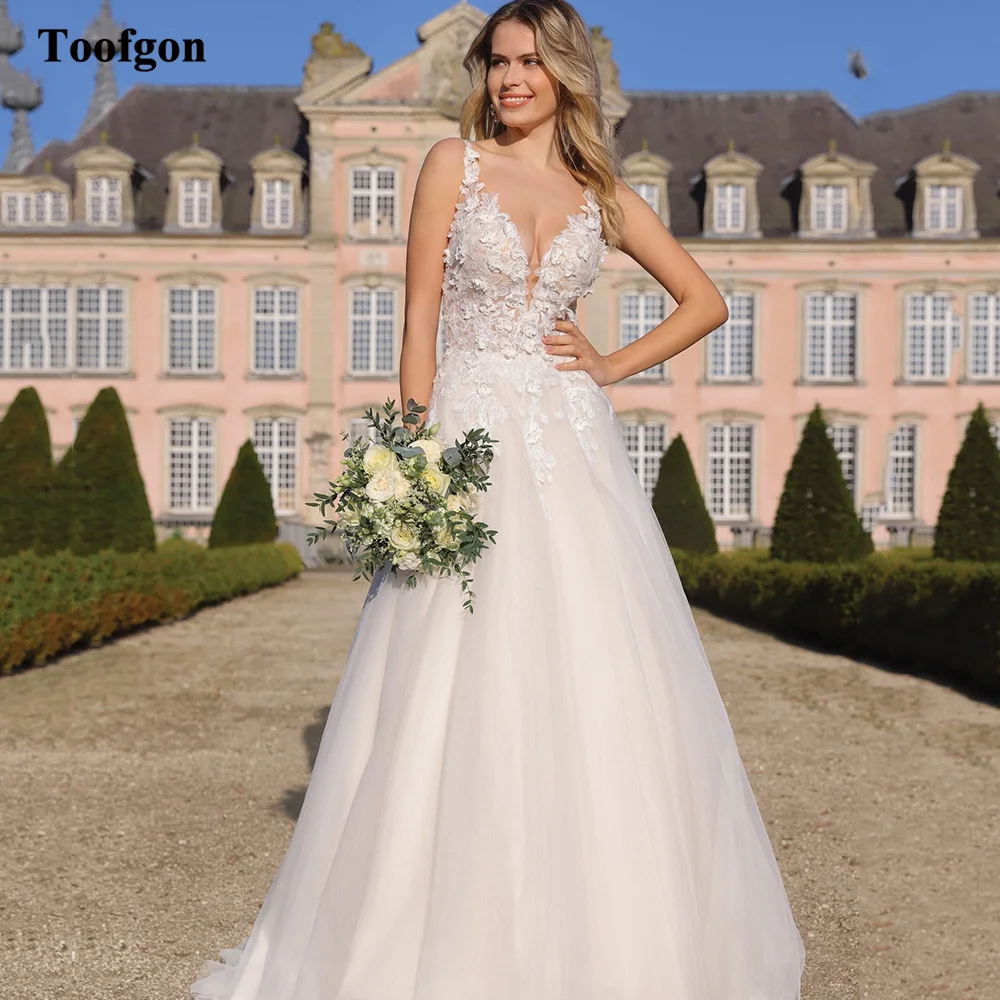 

Toofgon A Line Boho Bridal Gowns Deep V-neck Appliques Lace Formal Wedding Dresses Backless Countryside Princess Bride Dress