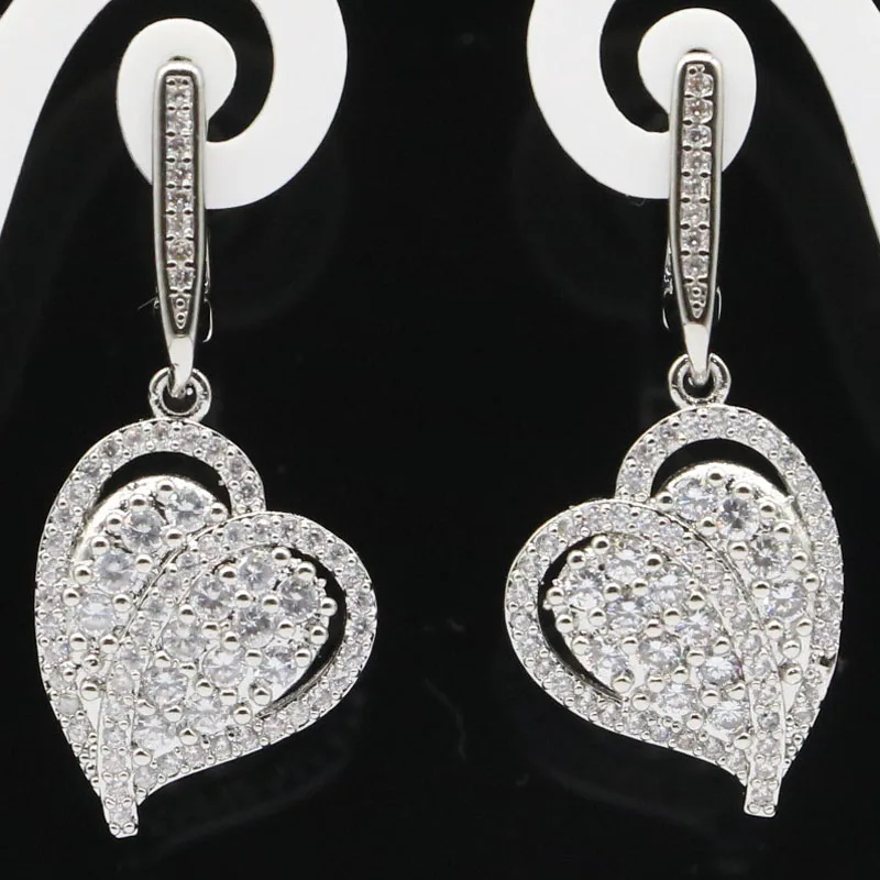 

Buy 4 Get 1 Free 35x17mm Stunning Eye Catching White Sapphire White CZ Woman's Engagement Silver Earrings