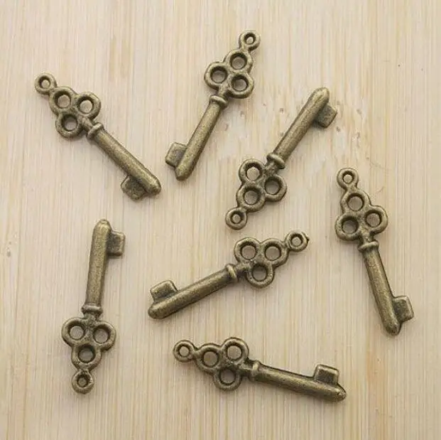 

30pcs 19x6.5mm;loop 0.9mm antiqued bronze tone little key design charms h0866