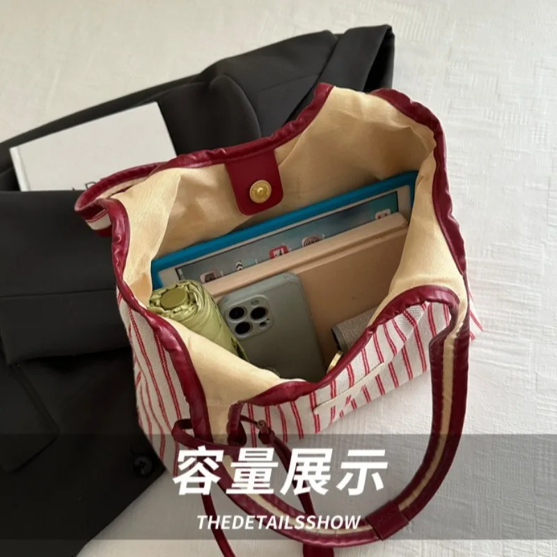 حقائب كتف نسائية كورية مخططة بسيطة ومتعددة الاستخدامات عالية الجودة مصممة على الموضة حقائب يد نسائية موضة 2026 #5