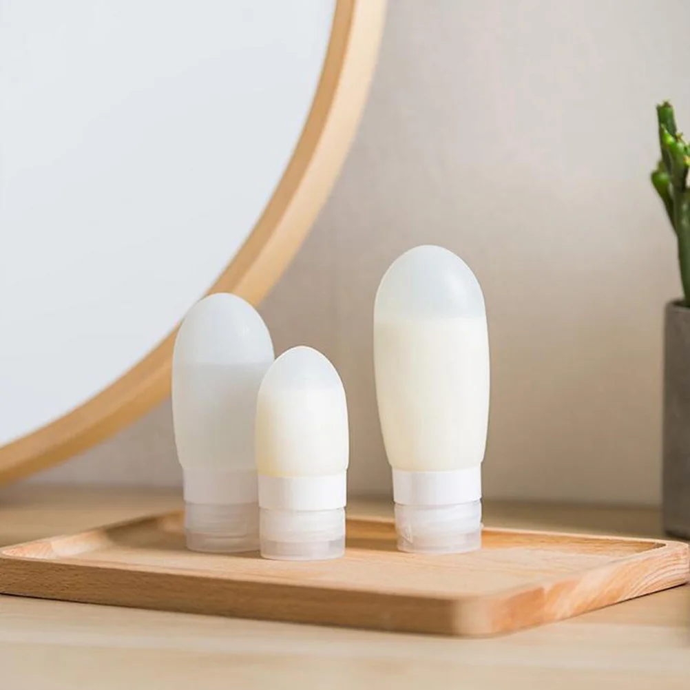 

4Pcs Silicone Travel Containers Bottles Heart Shape White Grey Leakproof Durable for Shampoo Lotion Makeup Remover