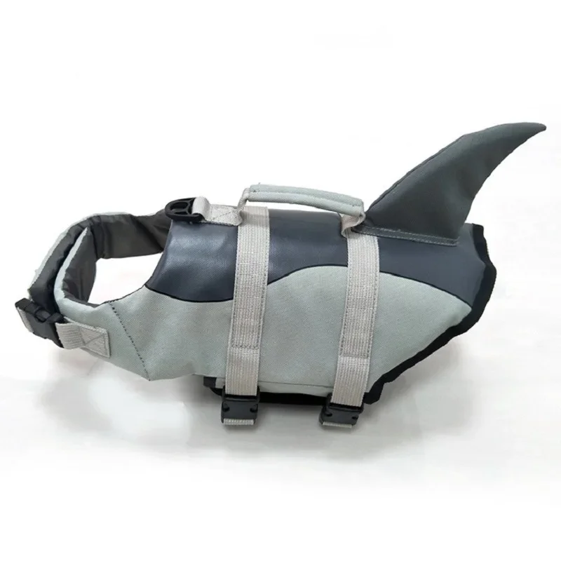 

Dog Life Jacket Shark, an adjustable dog safety vest with high buoyancy and rescue handle for small to medium sized dogs