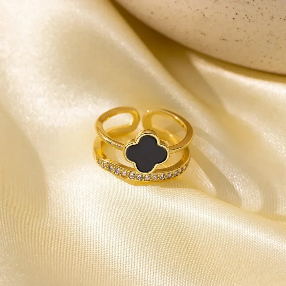 

2025newSimple four-leaf clover ring female black and white drop glaze zircon design opening niche light luxury spot