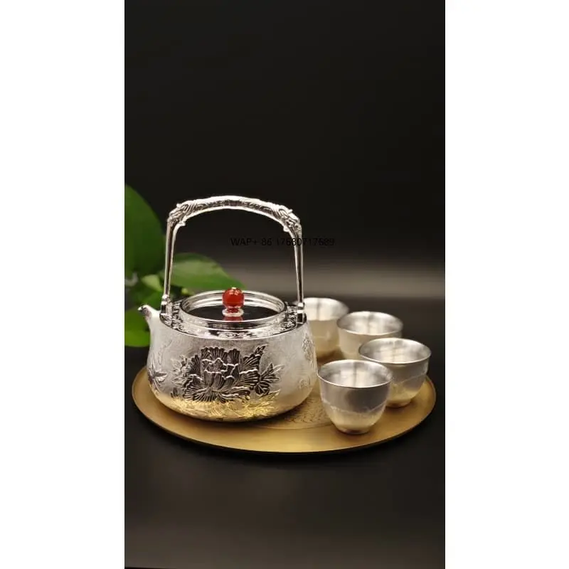 

Luxury Peony Design Silver Tea Set Hand Engraved Floral Pattern 6-Piece Tea Set Chinese Teapot Set with Tray
