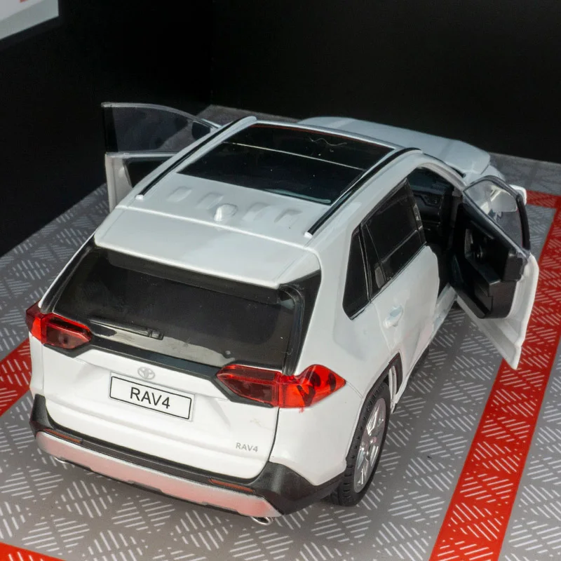 Puertas y capó de motor modelo de coche de aleación Toyota RAV4 1:24, el maletero se puede abrir adecuado para colección y se puede dar como regalo