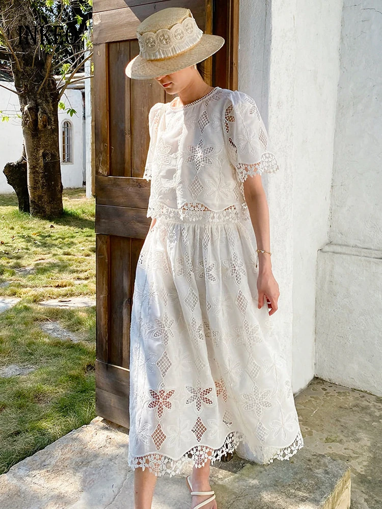 

Beach women's Lace 2 piece set Luxury Hollow out crop tops O-neck Short sleeve tops and midi skirt Lady outfit 2026 INKEO 5D047