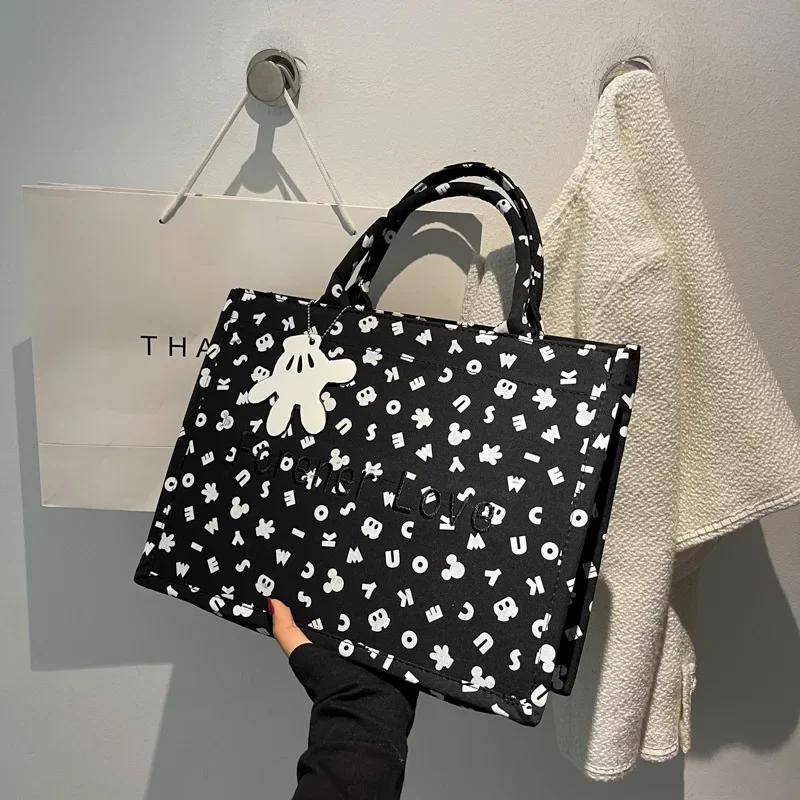 2024 New Disney Mickey borsa da donna Cartoon Cute Ladies borsa a tracolla borsa da viaggio di moda di marca di lusso di grande capacità