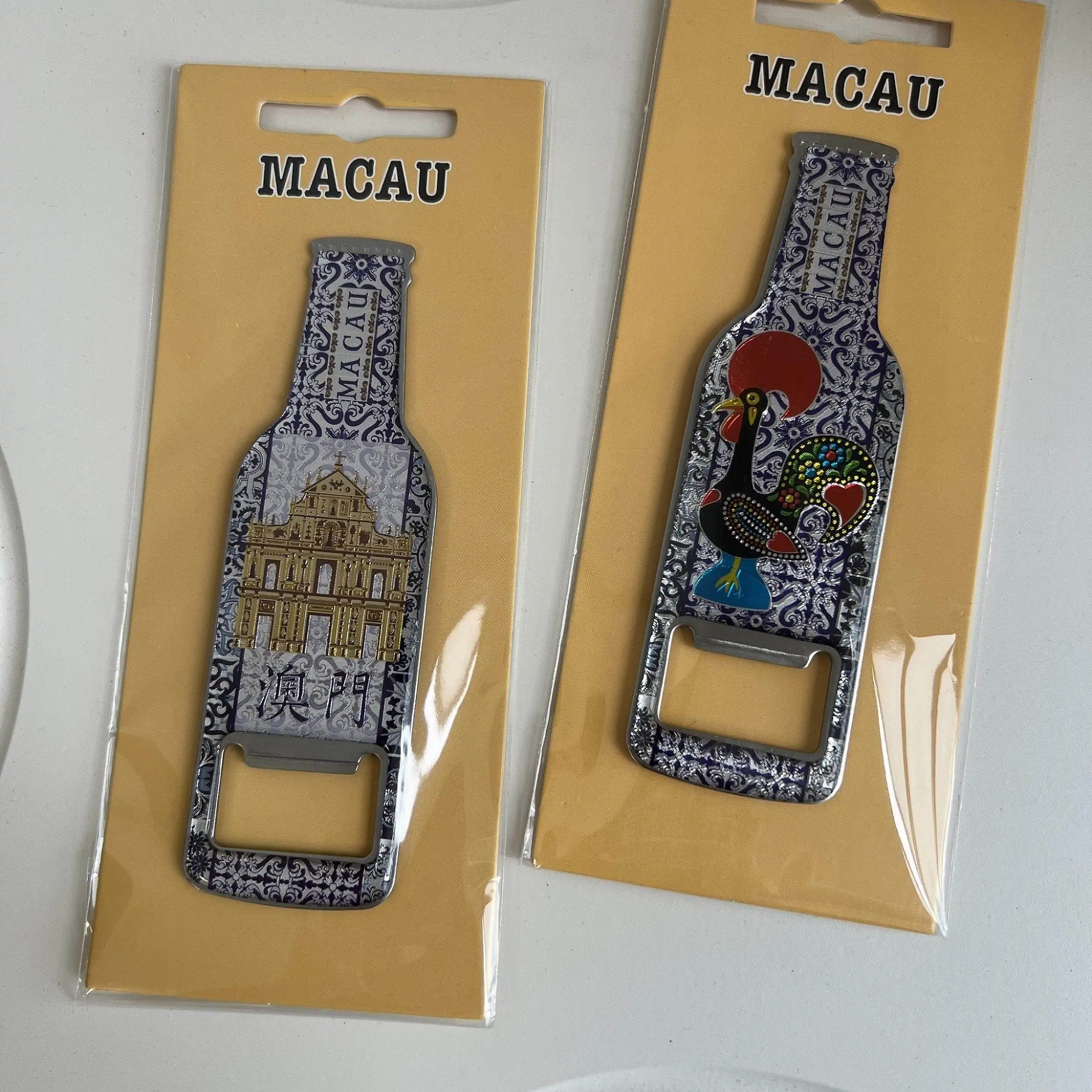 Macau's featured refrigerator sticker souvenir, Ruins of St. Paul's bottle opener, Portuguese rooster