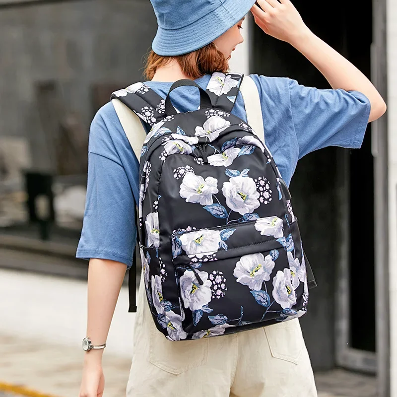 Mochila escolar con estampado para mujer, morral escolar de nailon para exteriores, mochila de moda para niñas y niños, novedad