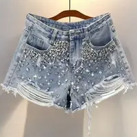 Y2K-pantalones cortos azules con borlas de diamantes desgastados, pantalones cortos vaqueros de pierna ancha holgados rasgados, pantalones cortos informales de moda coreana para mujer 2025
