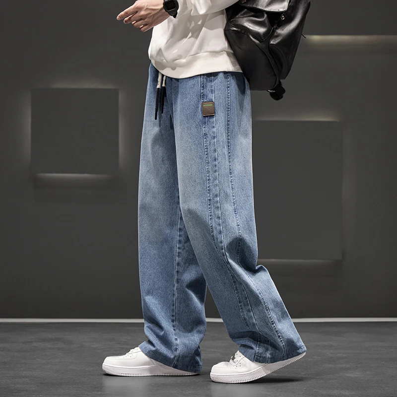 Autunno nuovi pantaloni jeans da lavaggio a gamba larga pantaloni da uomo tinta unita neutra pantaloni larghi casual dritti moda all'aperto taglia grande 8xl