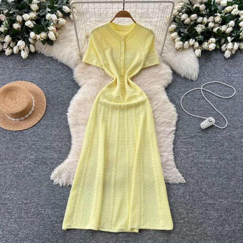 Elegante uitgeholde gebreide jurk zomerkleding dames 2026 korte mouw O-hals slanke lange jurken Franse stijl brei jurk