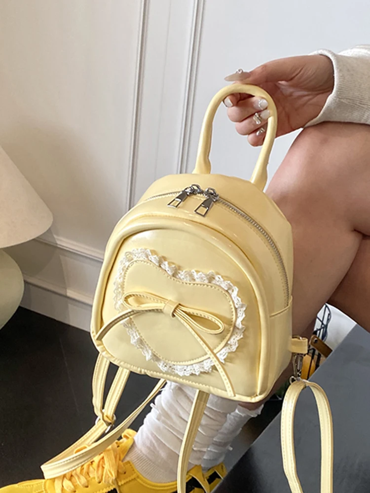 

Женский рюкзак в корейском стиле, студенческий рюкзак из искусственной кожи с бантом, высококачественный туристический рюкзак с текстурой, новинка 2025 года, модный универсальный рюкзак