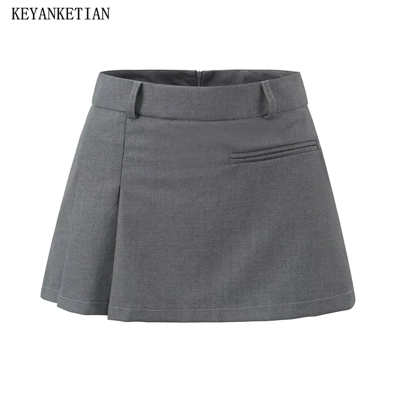 

KEYANKETIAN 2024 New Launch Women Back Zipper Low-rise Pleated Skirt Asymmetrical Design Solid color A-line Mini Skirt Pantskirt