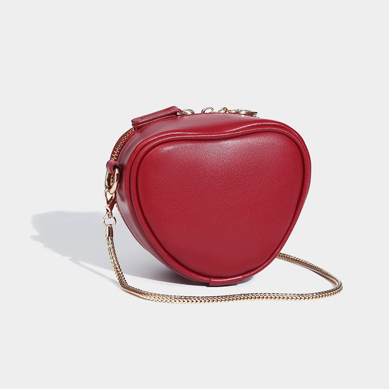 Borse a forma di cuore pesca a catena per le donne borse e portamonete di design di lusso 2024 nuovo nella moda Mini lettera decorare Crossbody