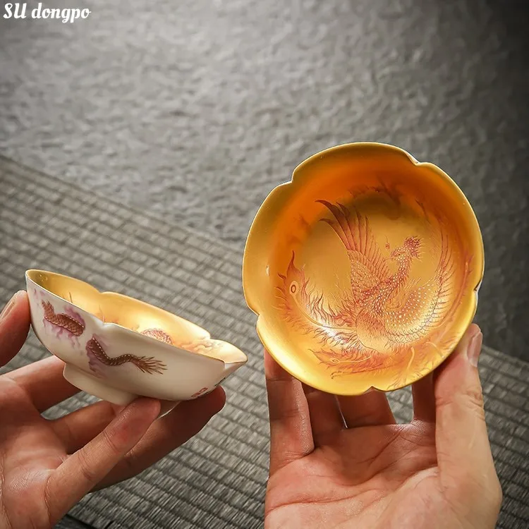 

Chinese Dragon and Phoenix Gilded Gold Jianzhan Sheep Fat Jade Porcelain Master Cup Petal Tea Bowl luxury Tea Gifts Collection