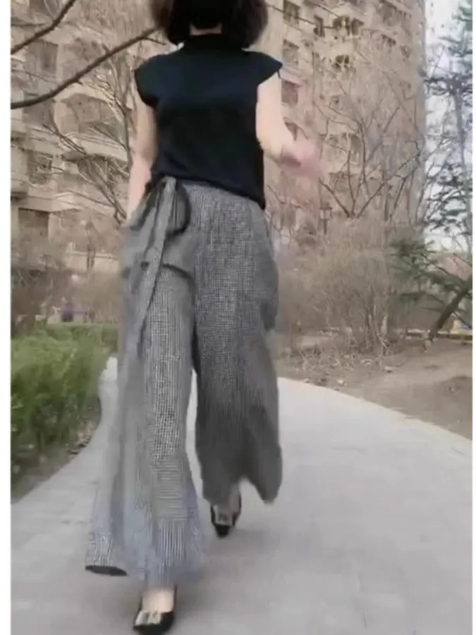 Szerokie spodnie damskie z wysokim stanem, luźny krój, bawełna i len, w kratę, artystyczne, proste, codzienne, wyszczuplające.