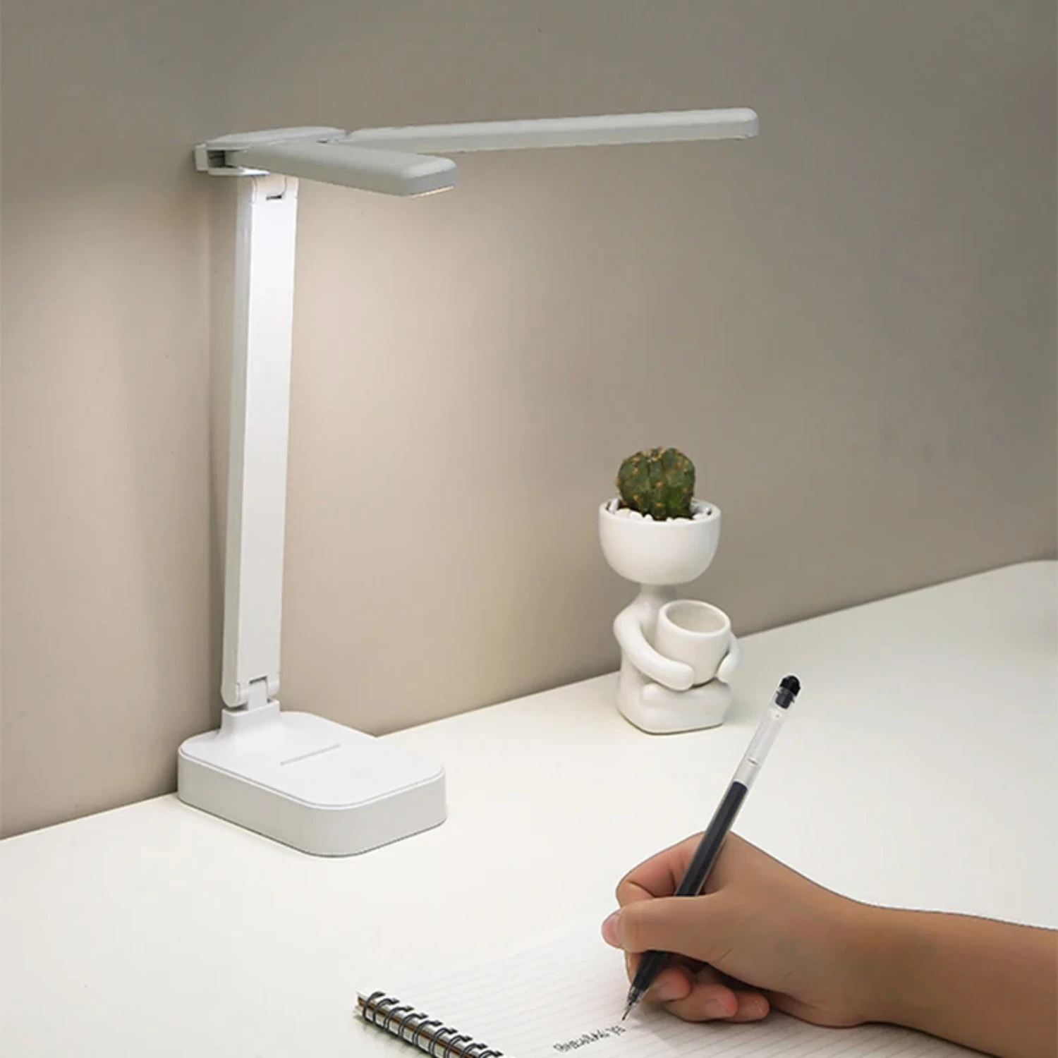 Portable, foldable, and convenient LED desk lamp with 3 dimmable brightness levels for eye protection in bedroom and office. Ver